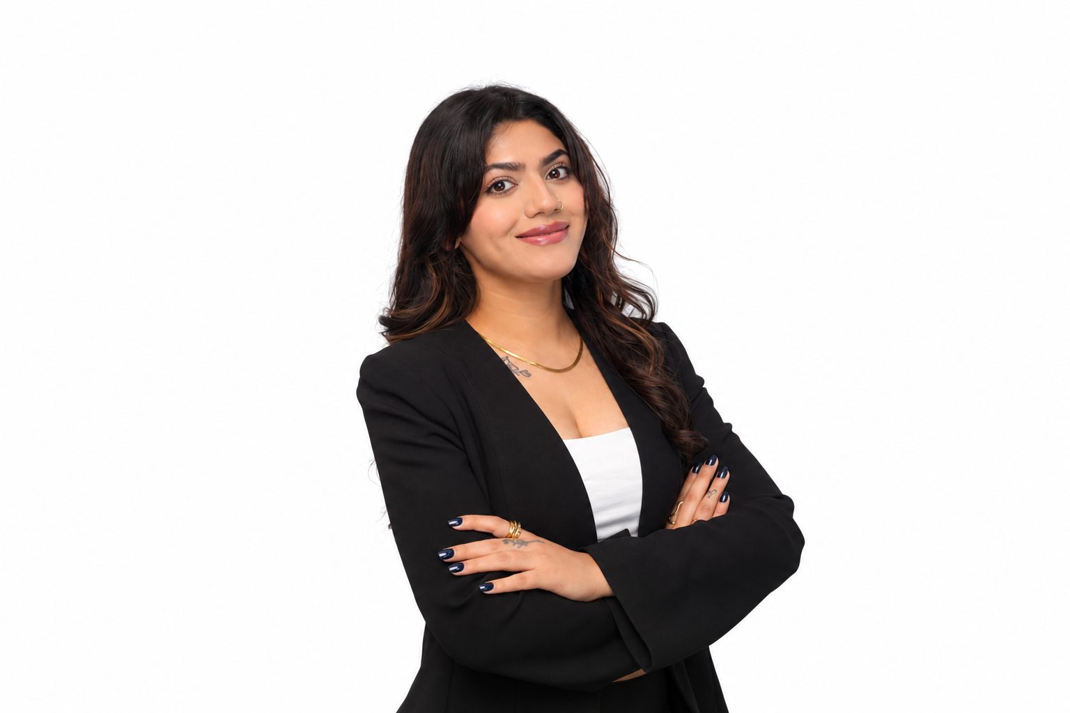 Simran Kaur, Associate Mortgage Broker, standing with arms crossed
